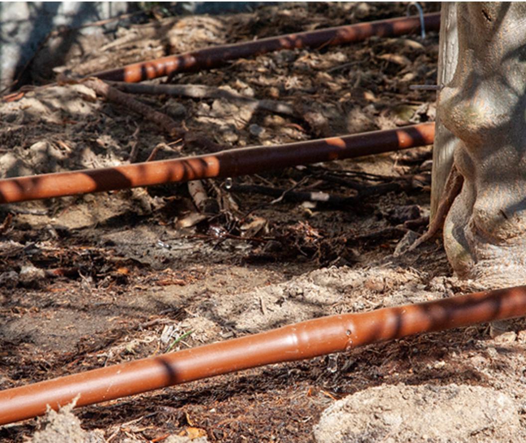 1/2" Pressure Compensating Dripline with Check Valve 1.0 GPH (17 mm, 12" Spacing, Brown, 100' Coil)